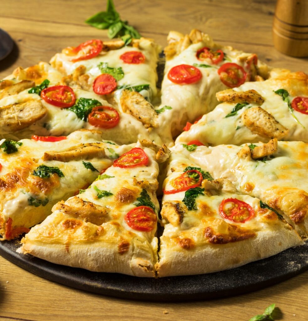 Chicken Alfredo Pizza at Big Daddy's Pizza SLC Image by bhofack2 from Getty Images