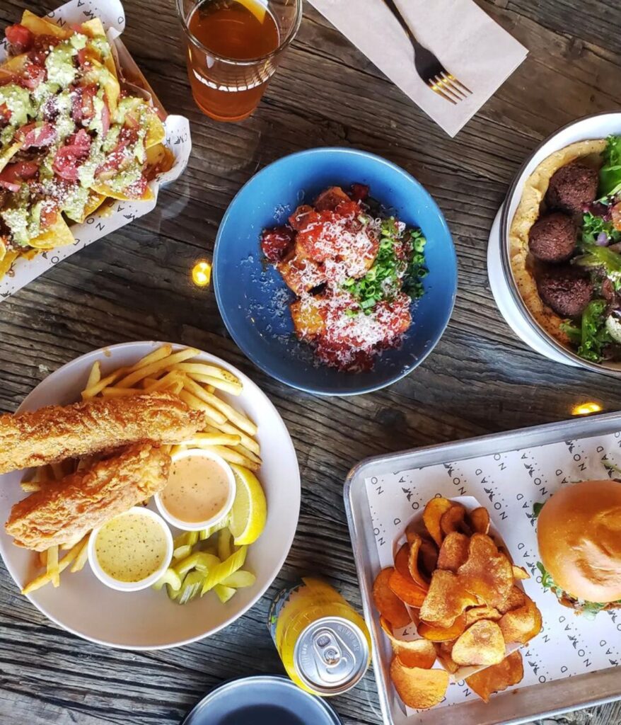 Stop in for some delicious burgers, sandos, shares, and salads at Nomad Eatery in Salt Lake City, UT Image from Instagram