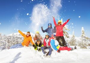 Happy skiers Things to Do in Salt Lake City in Winter phone by molchanovdmitry from Getty Images Pro